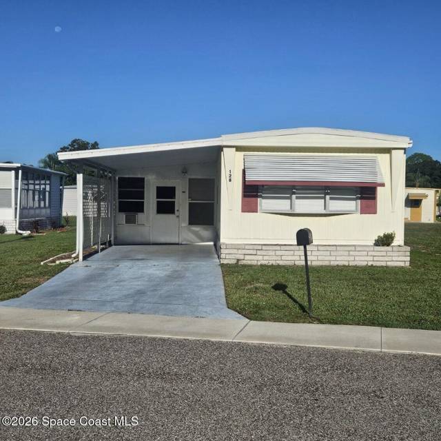128 Mystic Boulevard home for sale in Port Malabar Holiday Park