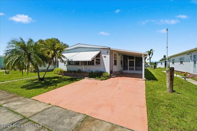 1818 Coco Plum Street home for sale in Palm Bay Colony