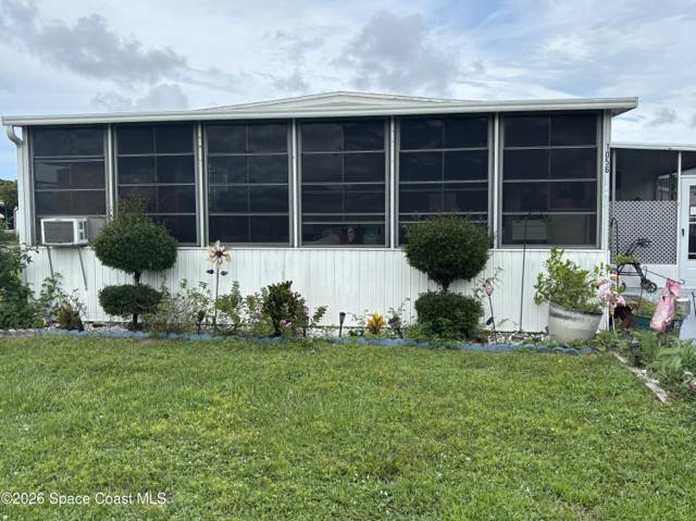 1056 Wood Court home for sale in Port Malabar Holiday Park