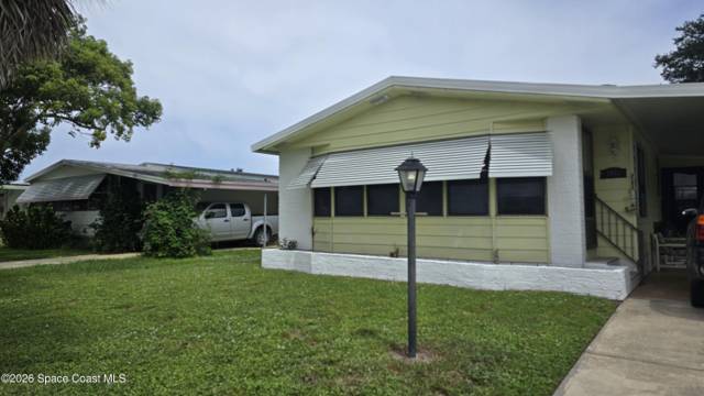 1471 Barefoot Circle, home for sale in Barefoot Bay
