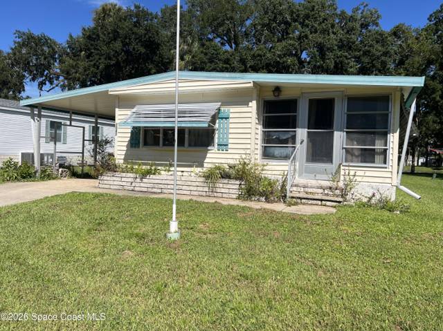1047 Sunflower Lane home for sale in Port Malabar Holiday Park