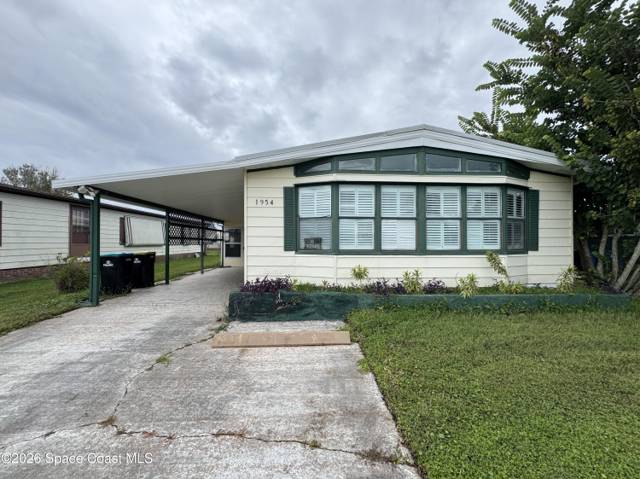 1954 Coco Plum Street home for sale in Palm Bay Colony