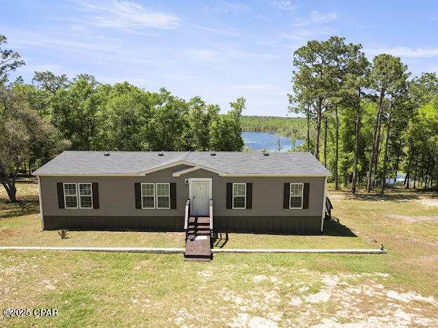 3 bedroom ManufacturedHome at 4120 Sunrise Trail, Sunset Pines, Chipley — photo 1