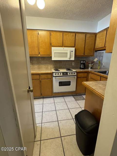 7125 N Lagoon Drive H, Panama City FL - photo 10 of 34