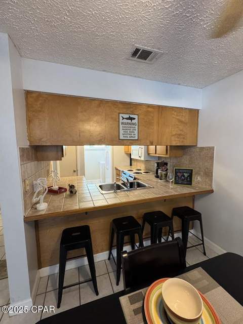 7125 N Lagoon Drive H, Panama City FL - photo 13 of 34