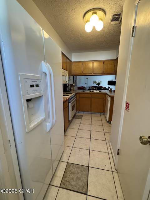 7125 N Lagoon Drive H, Panama City FL - photo 7 of 34