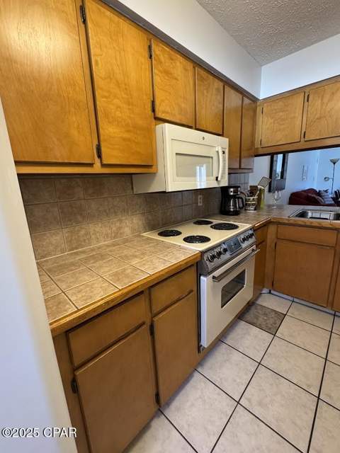 7125 N Lagoon Drive H, Panama City FL - photo 8 of 34