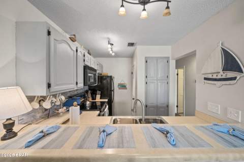8730 S Thomas Drive 107, Panama City Beach FL - photo 8 of 60