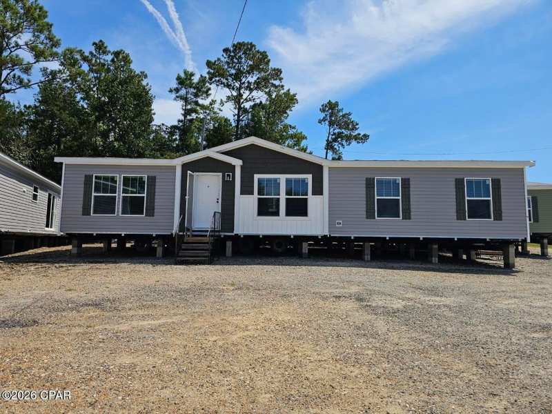 4 bedroom ManufacturedHome at 570 Apalachicola Avenue, Compass Lake Hills Unit 4, Alford — photo 1