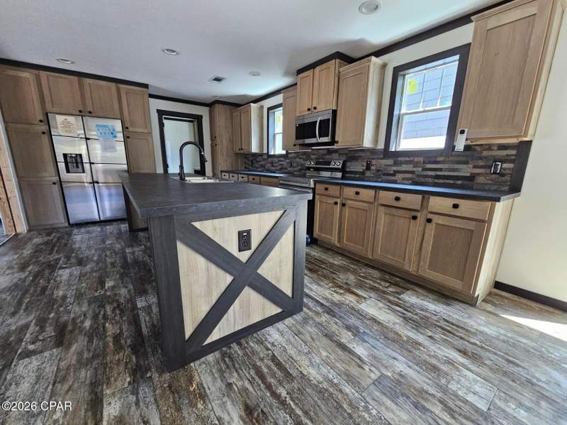 4 bedroom ManufacturedHome at 570 Apalachicola Avenue, Compass Lake Hills Unit 4, Alford — photo 2