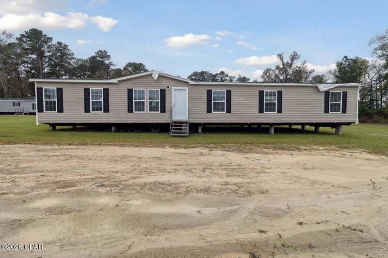 5 bedroom ManufacturedHome at Tbd Crotan Drive, Compass Lake Hills Unit 4, Alford — photo 1