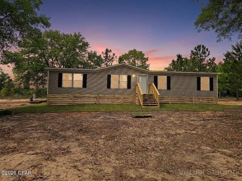 4 bedroom ManufacturedHome at 562 Apalachicola Avenue, Compass Lake Hills Unit 4, Alford — photo 1