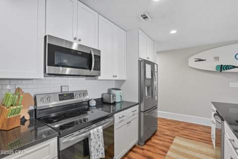 6903 N Lagoon Drive 51, Panama City Beach FL - photo 10 of 36