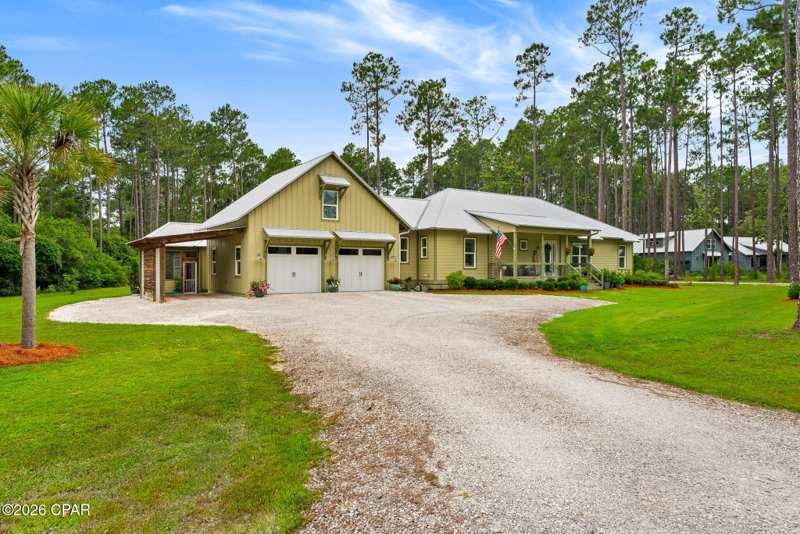 4 bedroom SingleFamilyResidence at 6408 River Bluff Trail, Rivercamps On Crooked Creek, Panama City Beach — photo 1