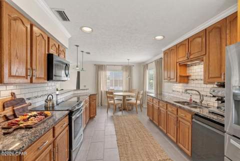 2306 Pretty Bayou Island Drive, Panama City FL - photo 9 of 63