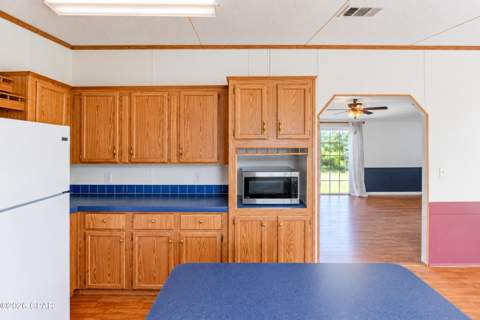 3772 Atlantis Drive, Southport FL - photo 7 of 51