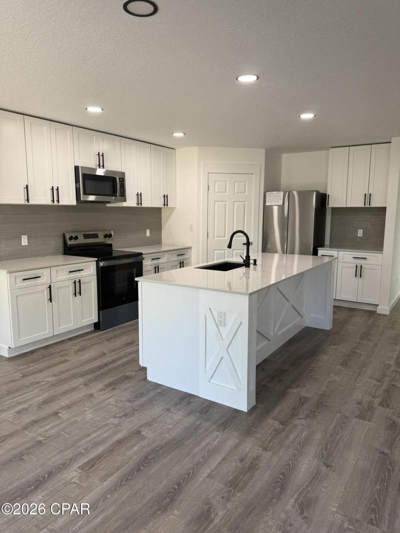 5 bedroom SingleFamilyResidence at 7183 Hatteras Boulevard, Olde Towne Village, Panama City — photo 3