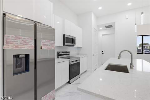 1436 Graham Cir, Lehigh Acres FL - photo 13 of 30