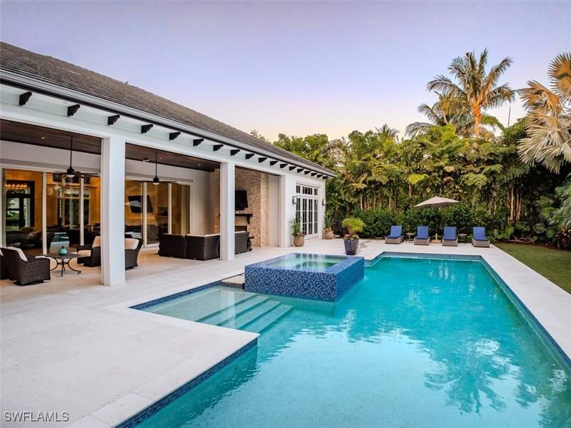 4 bedroom SingleFamilyResidence at 702 Bobwhite Ln, Pelican Bay Woods, Naples — photo 2
