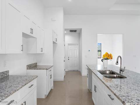 902 Williams Ave, Lehigh Acres FL - photo 11 of 35