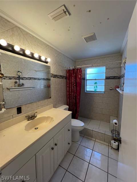 1116 Gifford Ave S, Lehigh Acres FL - photo 9 of 10