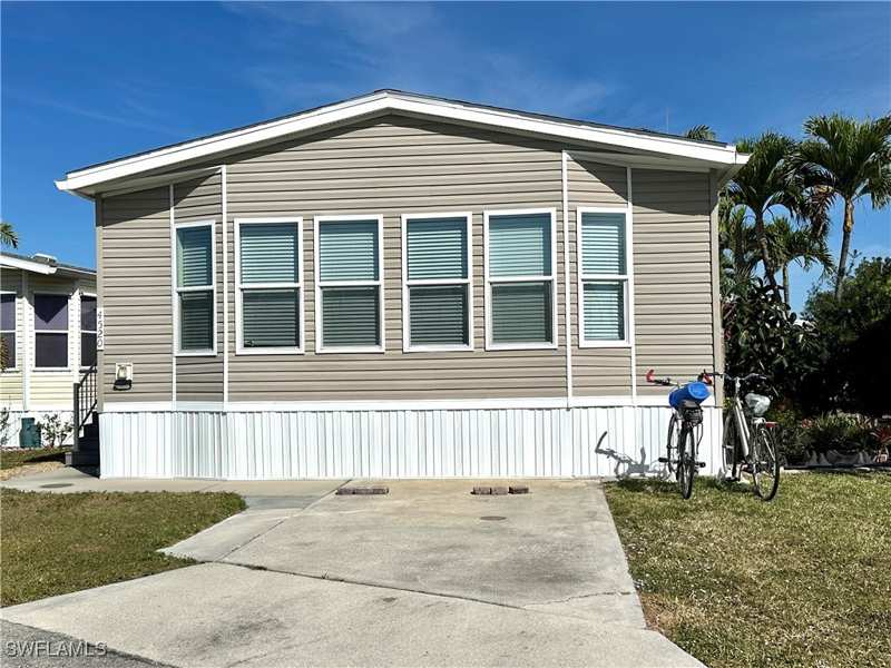 2 bedroom ManufacturedHome at 4520 Split Log Ln E, Riverwoods Plantation, Estero — photo 1