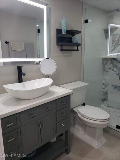 5435 Rattlesnake Hammock Rd E-102, Naples FL - photo 19 of 32