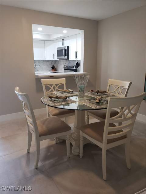 5435 Rattlesnake Hammock Rd E-102, Naples FL - photo 9 of 32