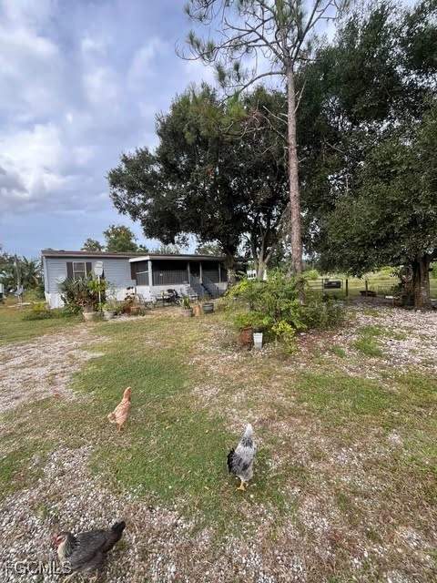 4 bedroom ManufacturedHome at 17181 Katydid Ln, Wildcat Farms, Fort Myers — photo 2