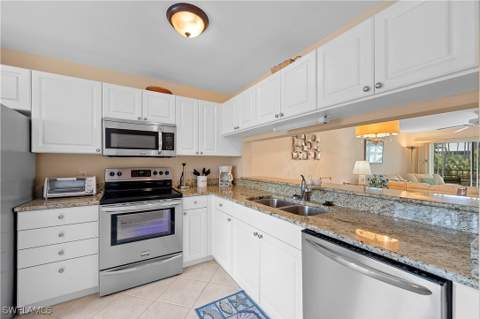 3072 Sandpiper Bay Cir M202, Naples FL - photo 16 of 42