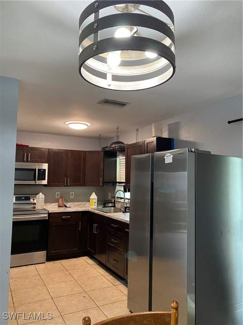 2609 Owen Ave S, Lehigh Acres FL - photo 8 of 37