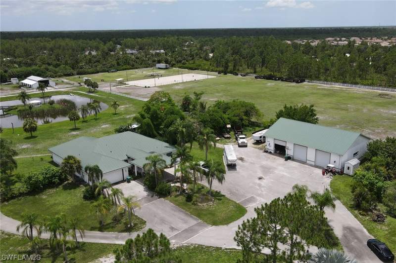 4 bedroom SingleFamilyResidence at 2400 Oil Well Rd, Golden Gate Estates, Naples — photo 4