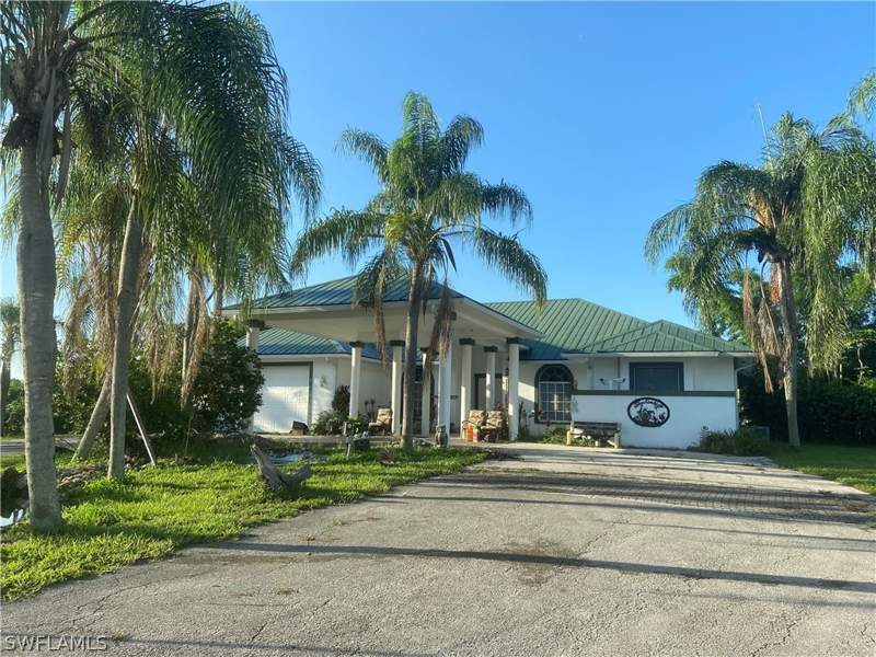 4 bedroom SingleFamilyResidence at 2400 Oil Well Rd, Golden Gate Estates, Naples — photo 5