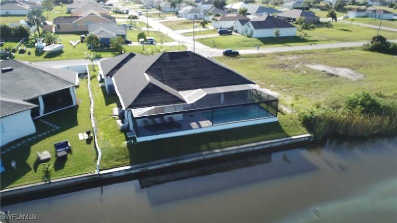 5 bedroom SingleFamilyResidence at 702 NW 30th Pl, Cape Coral, Cape Coral — photo 2