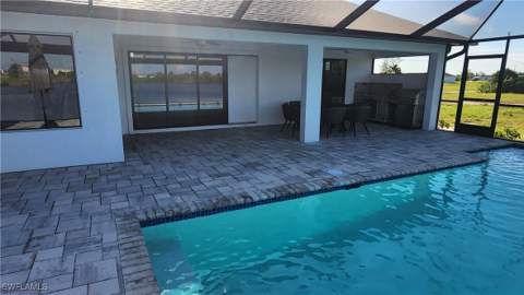 702 NW 30th Pl, Cape Coral FL - photo 6 of 30