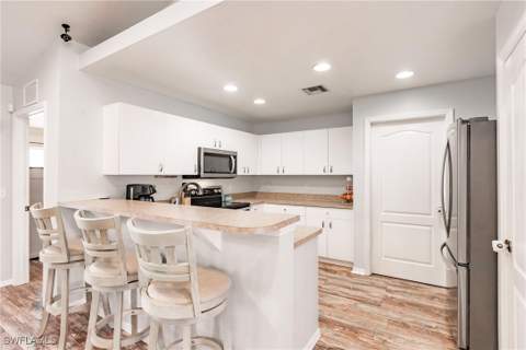 324 Parkdale Blvd, Lehigh Acres FL - photo 8 of 42