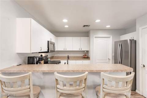 324 Parkdale Blvd, Lehigh Acres FL - photo 9 of 42