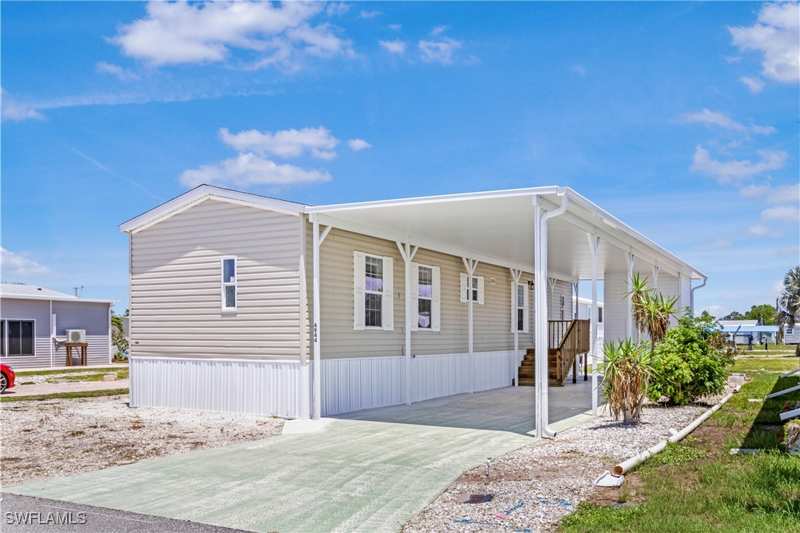 2 bedroom ManufacturedHome at 4944 Porky Ln, Pine Island Cove, St James City — photo 1