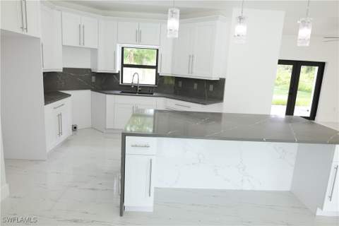 407 Washington Ave, Lehigh Acres FL - photo 12 of 46