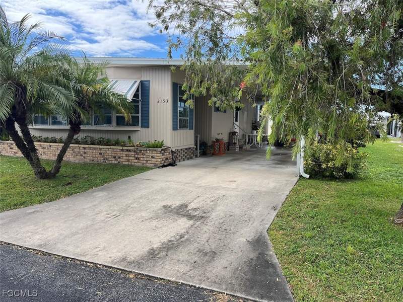 2 bedroom ManufacturedHome at 3153 Orchard Dr, Lake Arrowhead Mob Village, North Fort Myers — photo 2