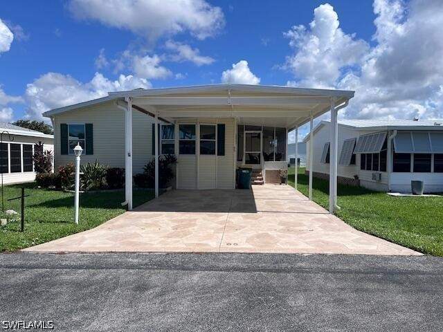 3 bedroom ManufacturedHome at 65 Turquoise Ave 65T, Enchanting Shores, Naples — photo 1