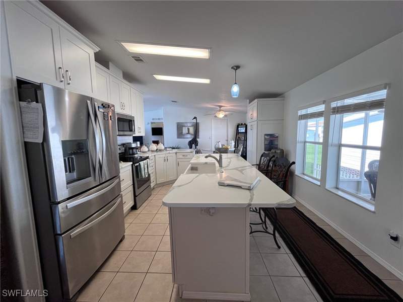 3 bedroom ManufacturedHome at 65 Turquoise Ave 65T, Enchanting Shores, Naples — photo 2
