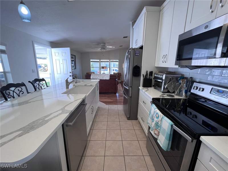 3 bedroom ManufacturedHome at 65 Turquoise Ave 65T, Enchanting Shores, Naples — photo 4