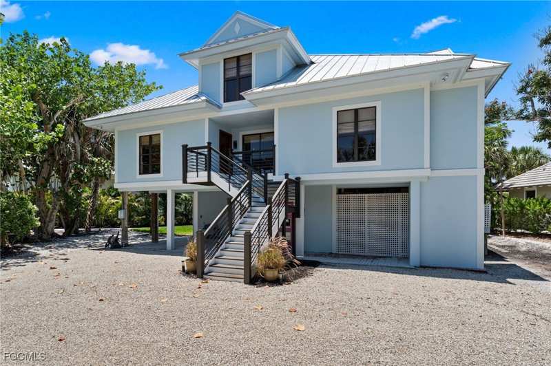 4 bedroom SingleFamilyResidence at 419 Lighthouse Way, Yachtsmans Cove, Sanibel — photo 1