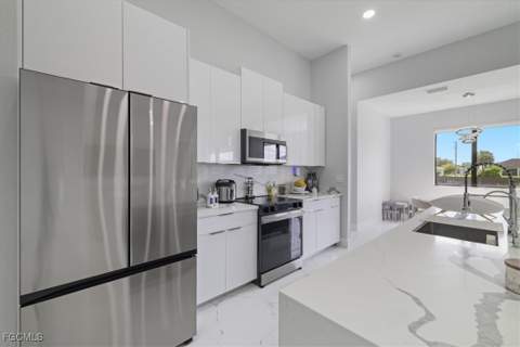 1310 NW 10th Ter, Cape Coral FL - photo 12 of 36