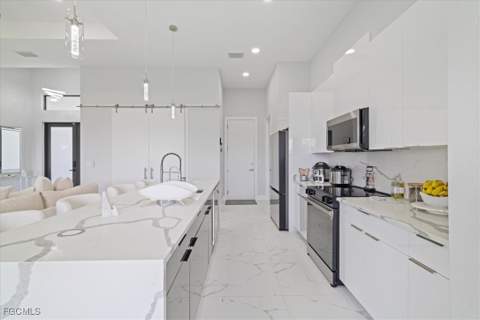 1310 NW 10th Ter, Cape Coral FL - photo 13 of 36