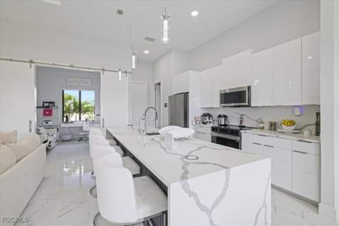 1310 NW 10th Ter, Cape Coral FL - photo 8 of 36
