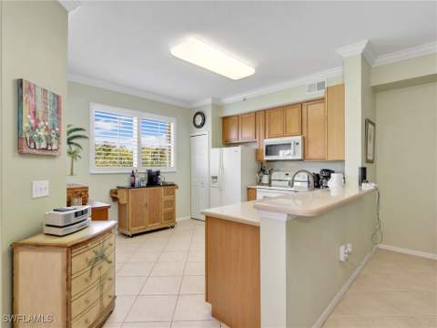 6824 Sterling Greens Pl 3303, Naples FL - photo 7 of 35