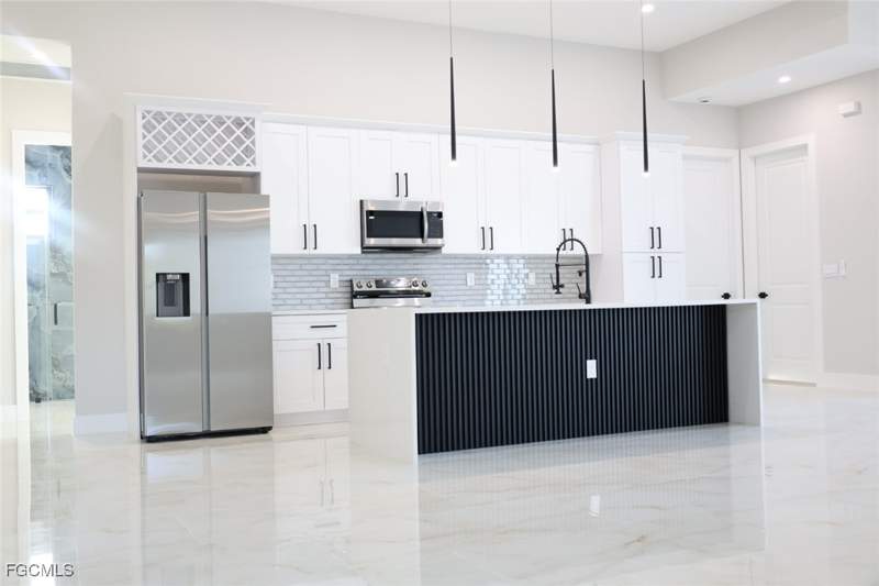 5 bedroom SingleFamilyResidence at 3512 9th St W, Island Of Happiness, Lehigh Acres — photo 3