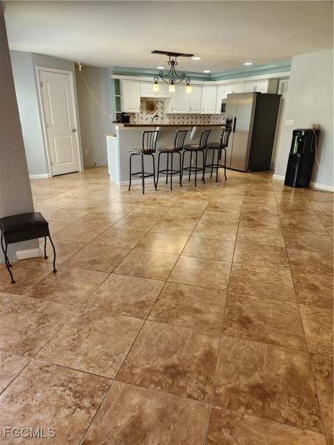 207 SE 47th Ter, Cape Coral FL - photo 7 of 27
